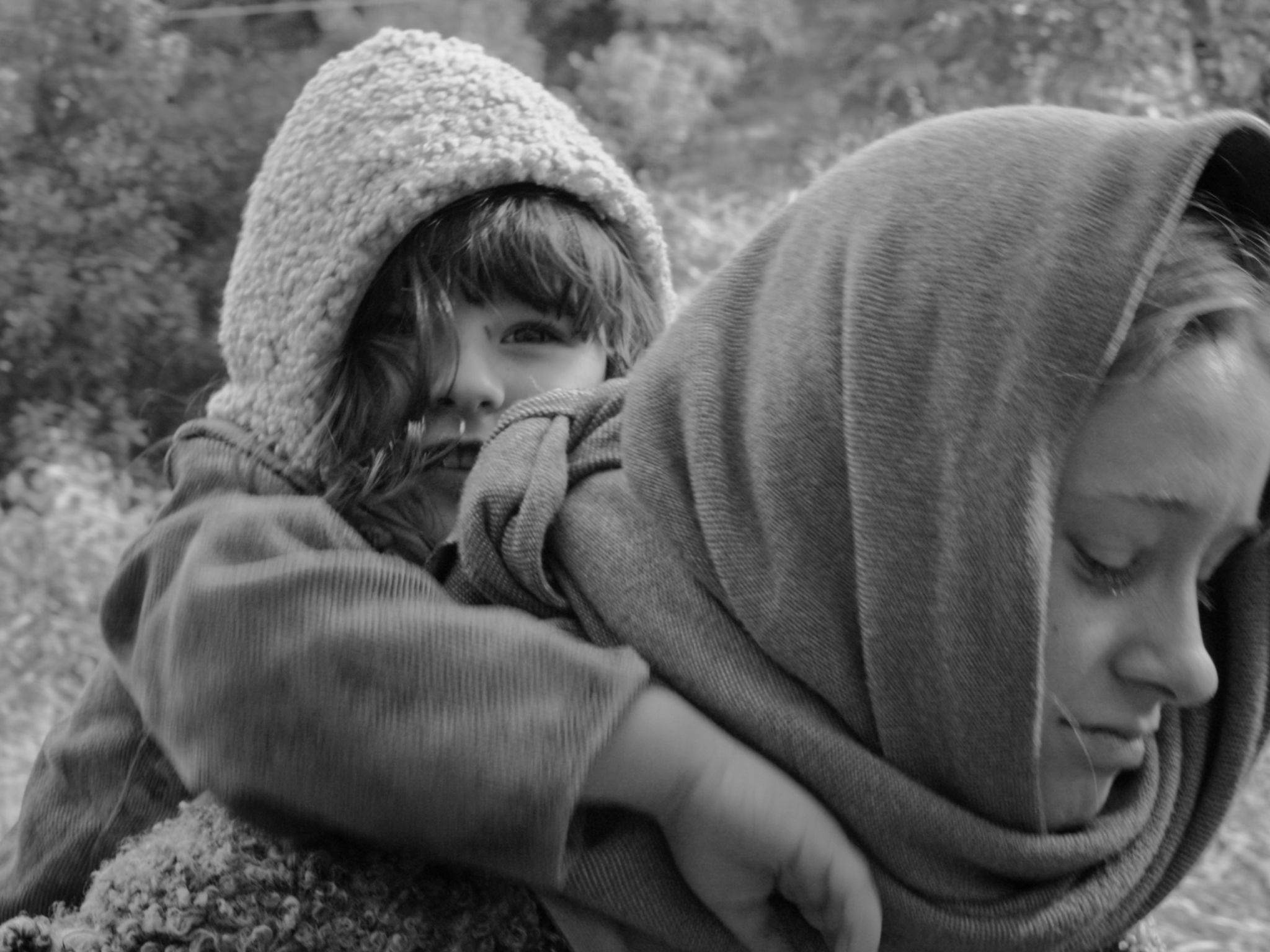 There Are No Children still, child carried through landscape